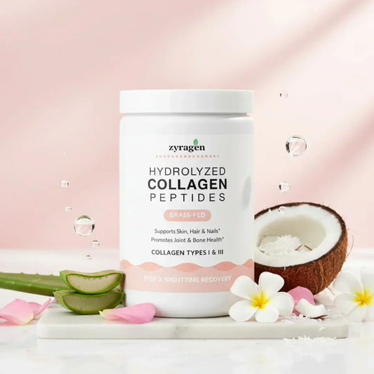 Zyragen Hydrolyzed Collagen Peptides supplement tub in a beauty setting with flowers in a pink background.