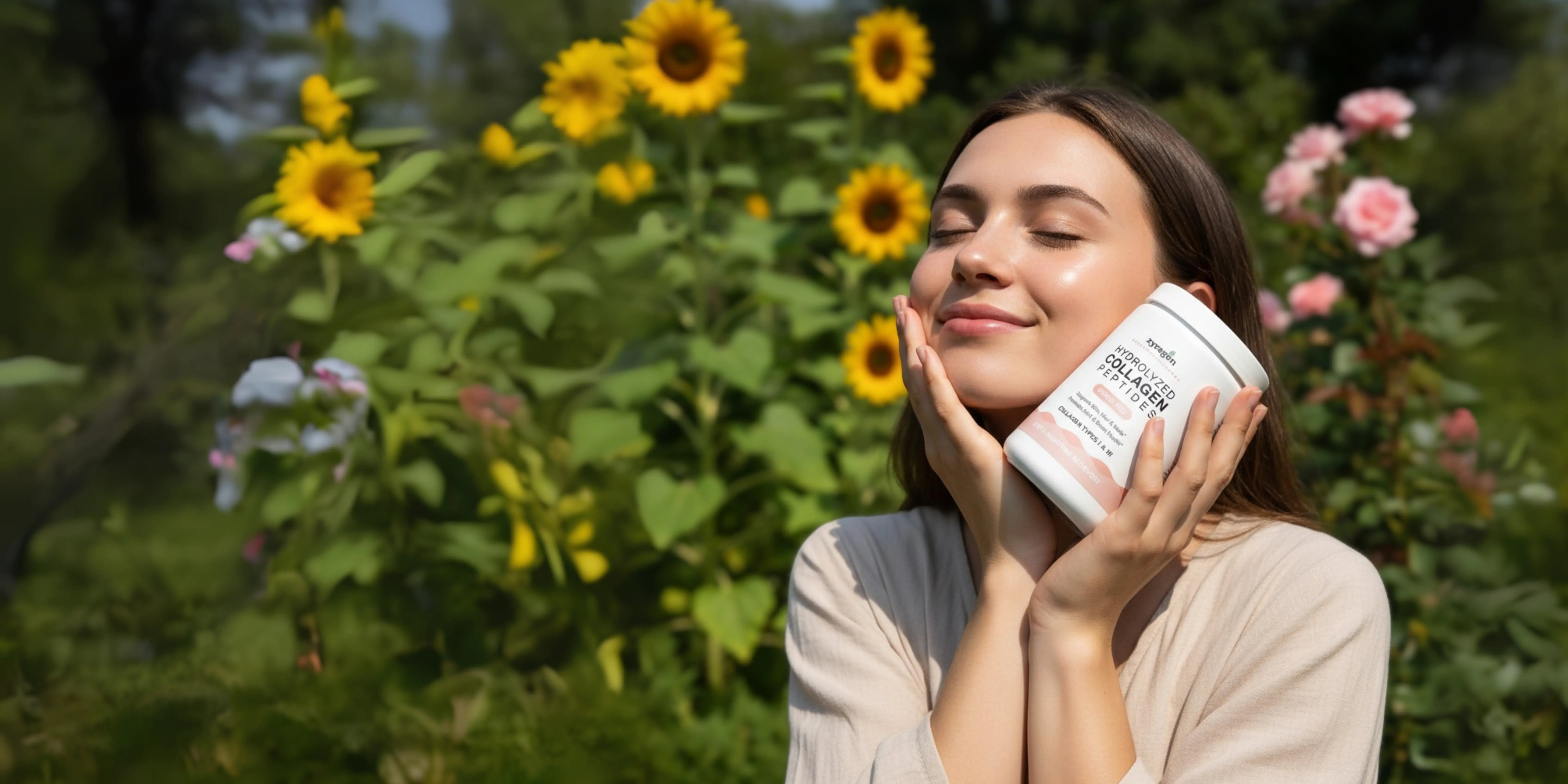 Woman holding a container of Zyragen Hydrolyzed Collagen Peptides in a sunflower field